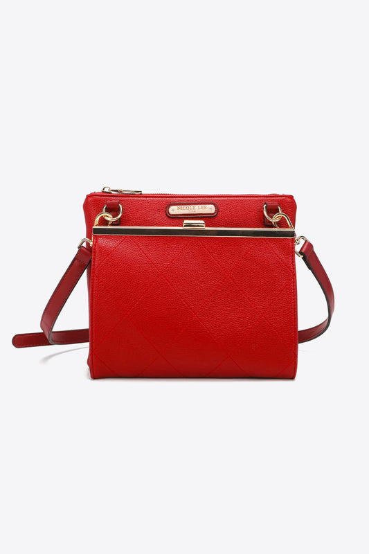 Red handbag with gold accents on a white background